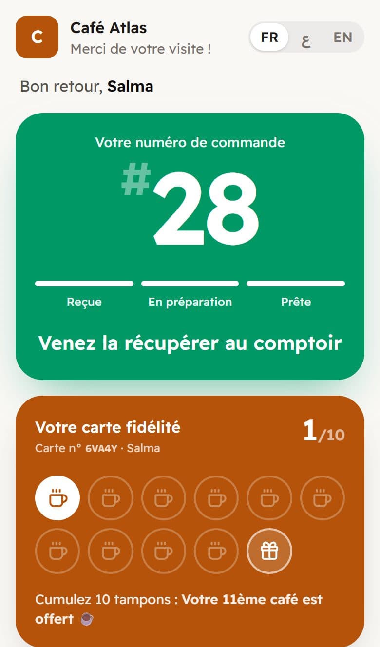 Téléphone d'un client affichant la commande 14 prête à récupérer
